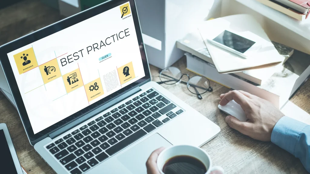 A professional working on the best website development frameworks, showcasing icons and buttons for development.