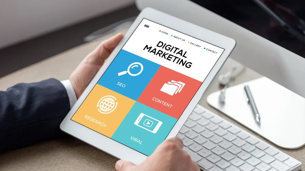 Tablet displaying Digital Marketing icons such as SEO and content, emphasizing the importance of Digital Marketing Services for Small Businesses.